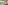 Panoramic bedroom view of distant waterfall, lush jungle, and wooden ceiling.