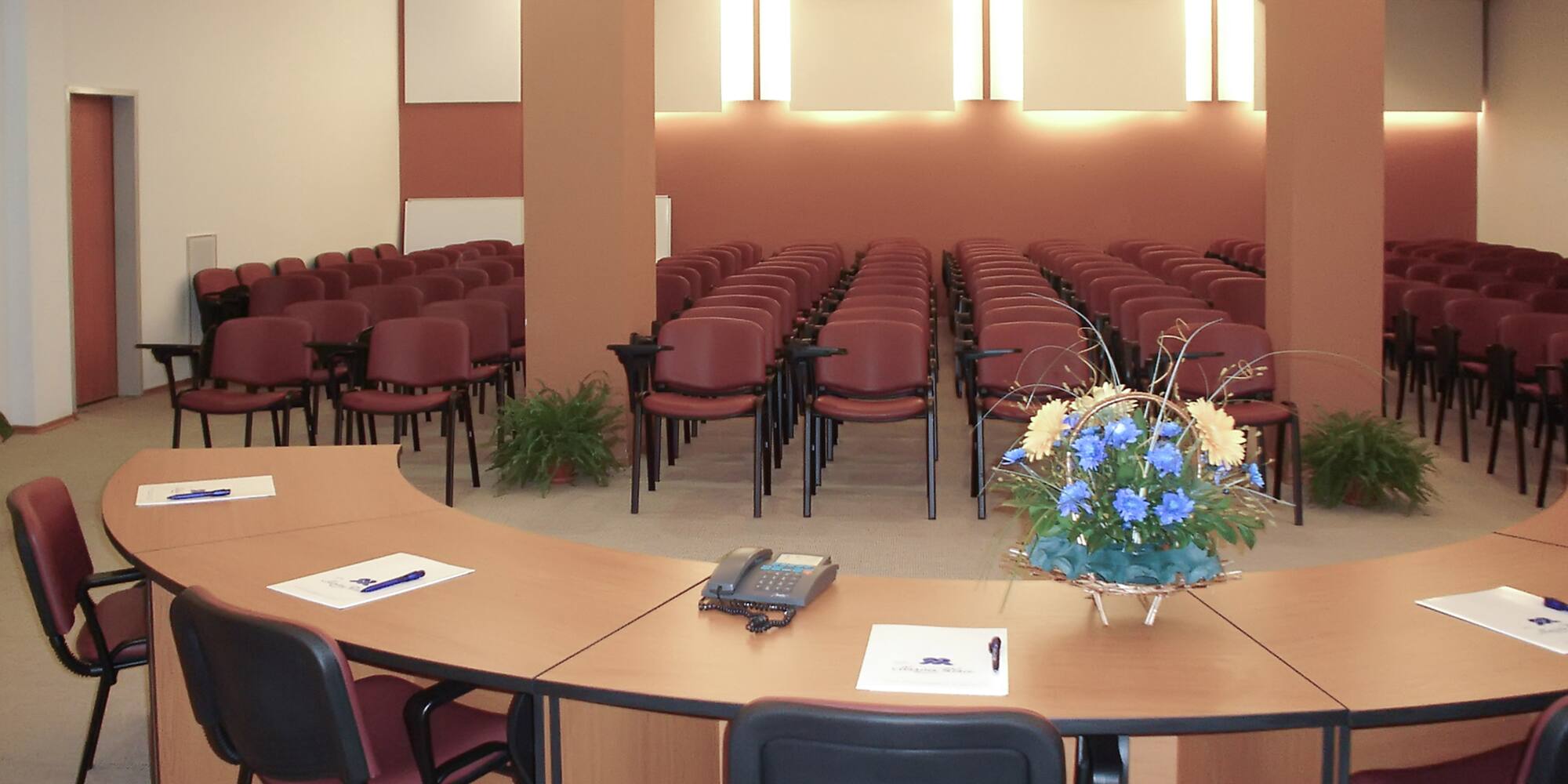 a room with chairs and a table