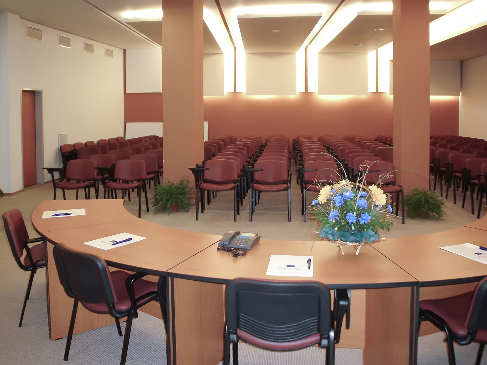 a room with chairs and a table