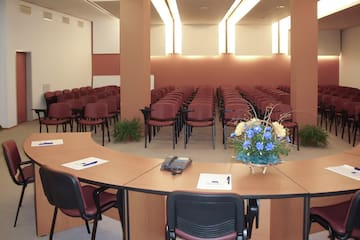 a room with chairs and a table