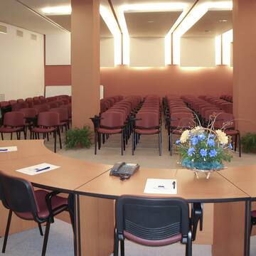 a room with chairs and a table