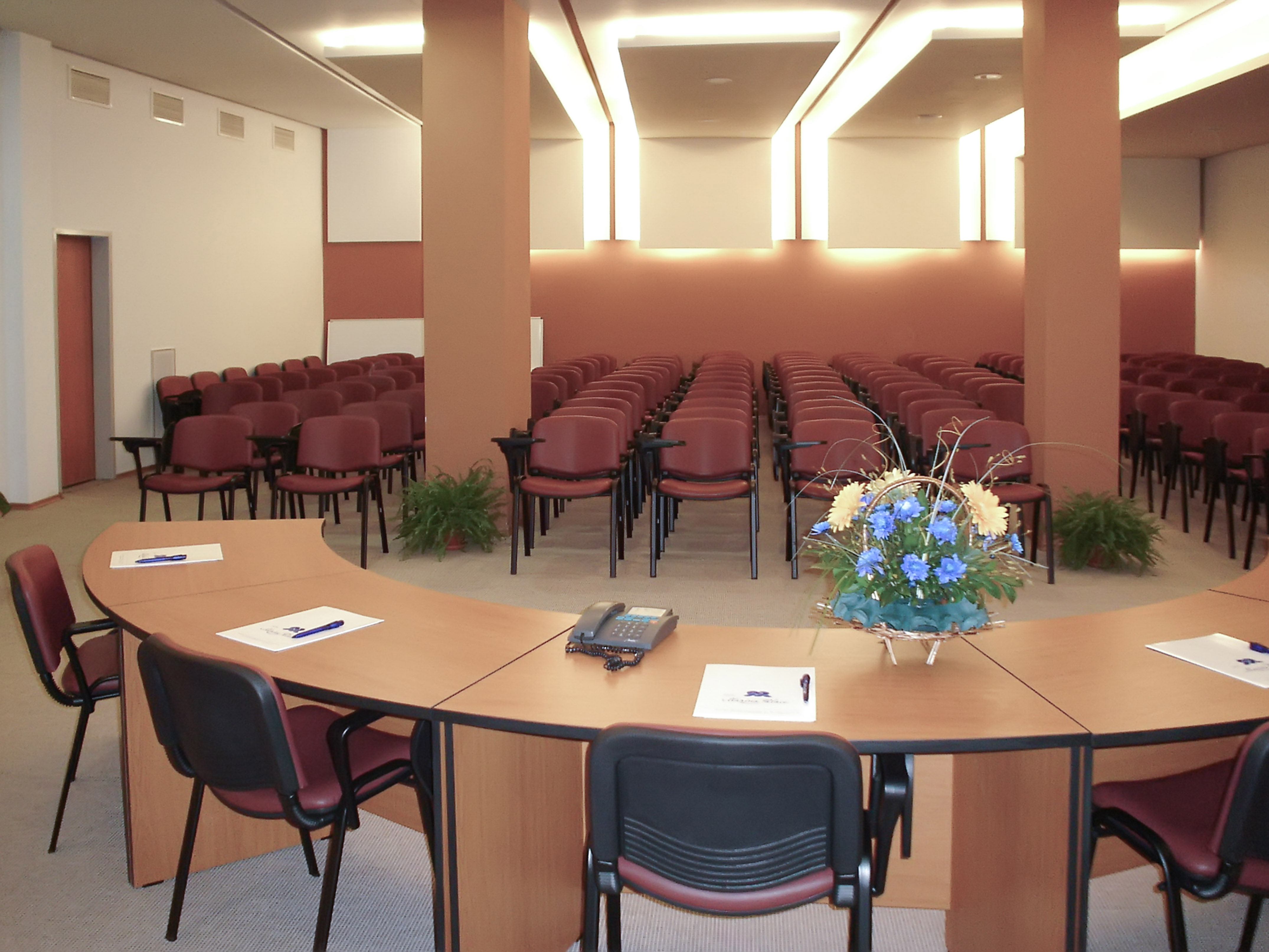 a room with chairs and a table