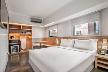a room with a bed and a table