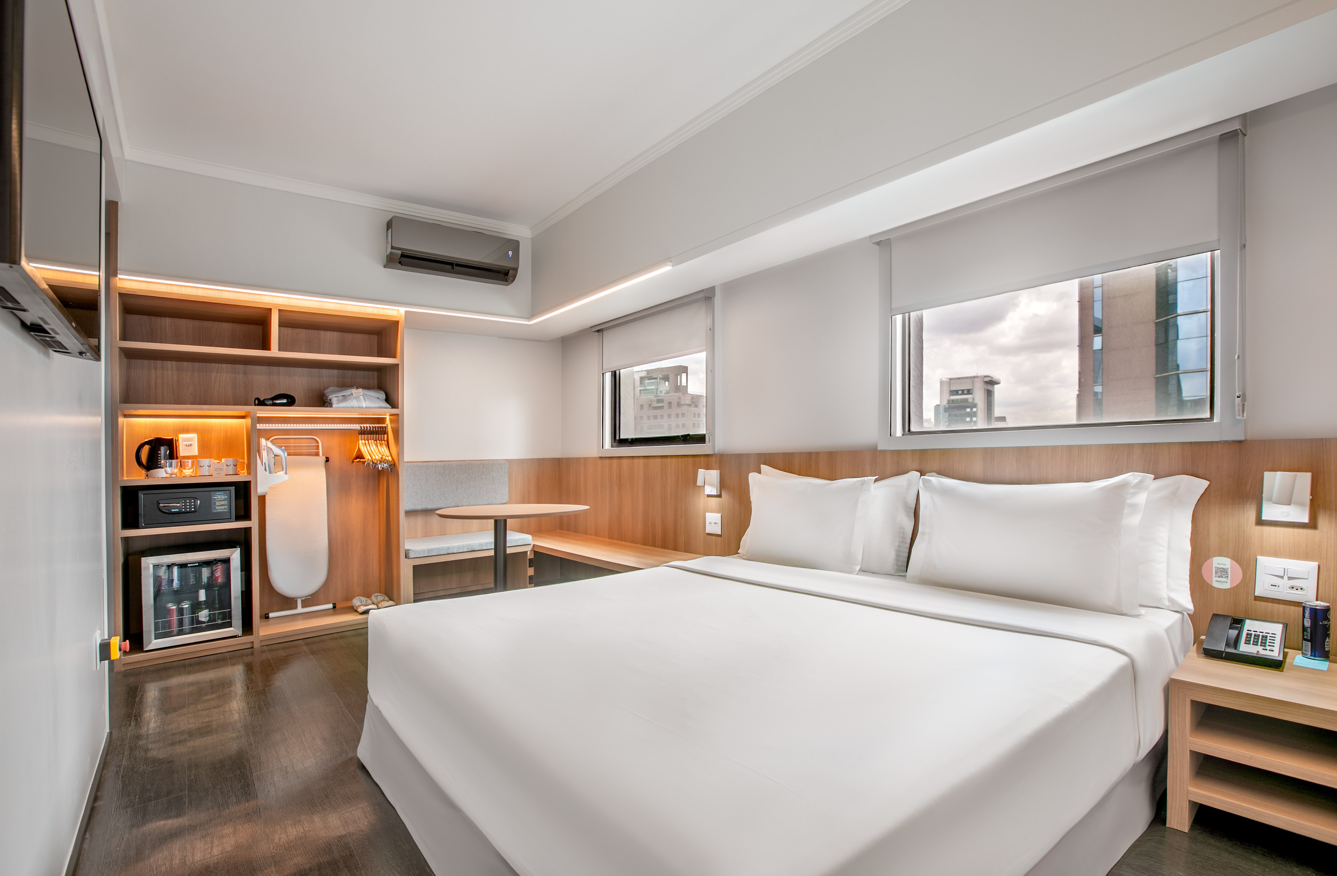 a room with a bed and a table