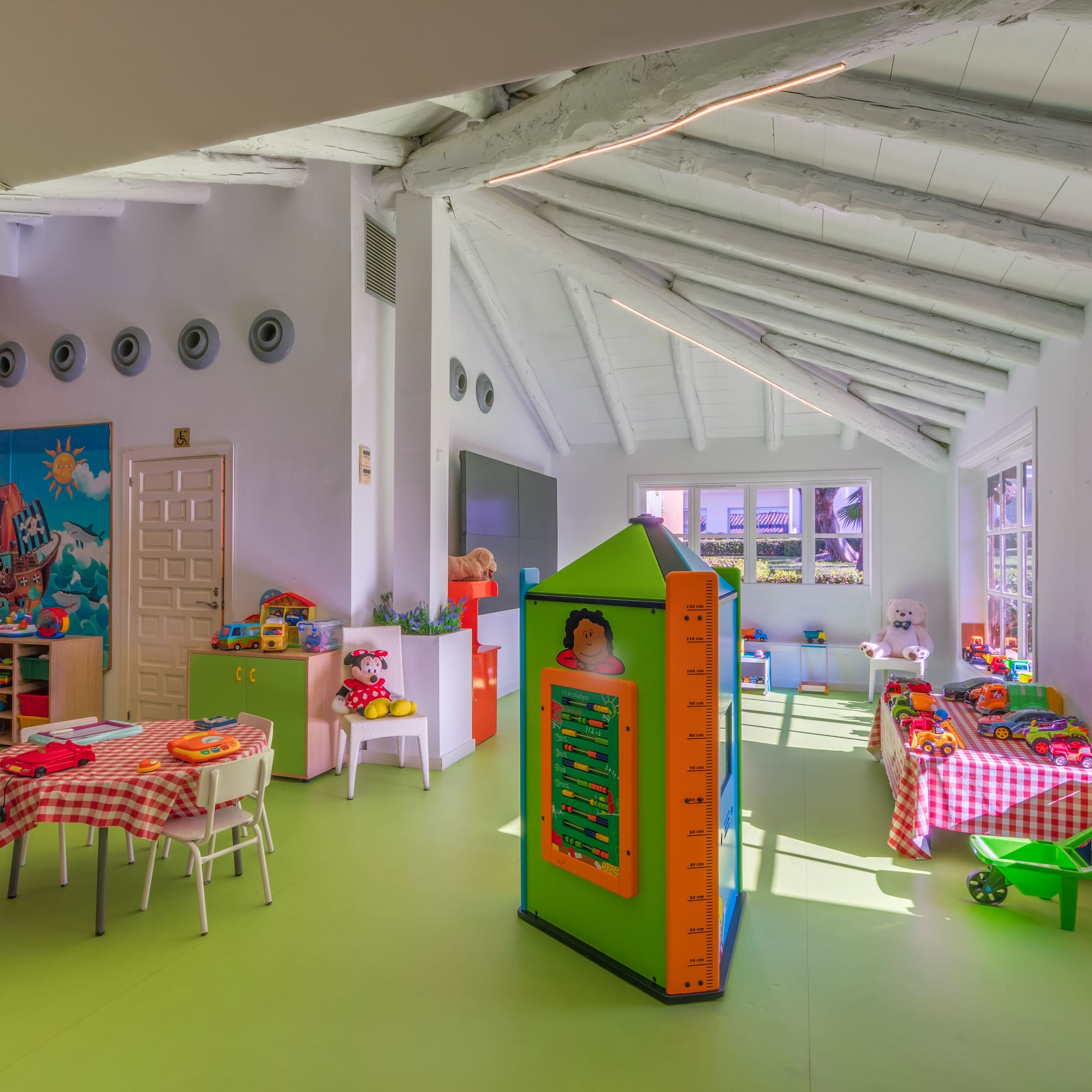 a room with a playroom and a playroom with a playroom and a playroom with a playroom and a playroom with a playroom and a playroom with a playroom and