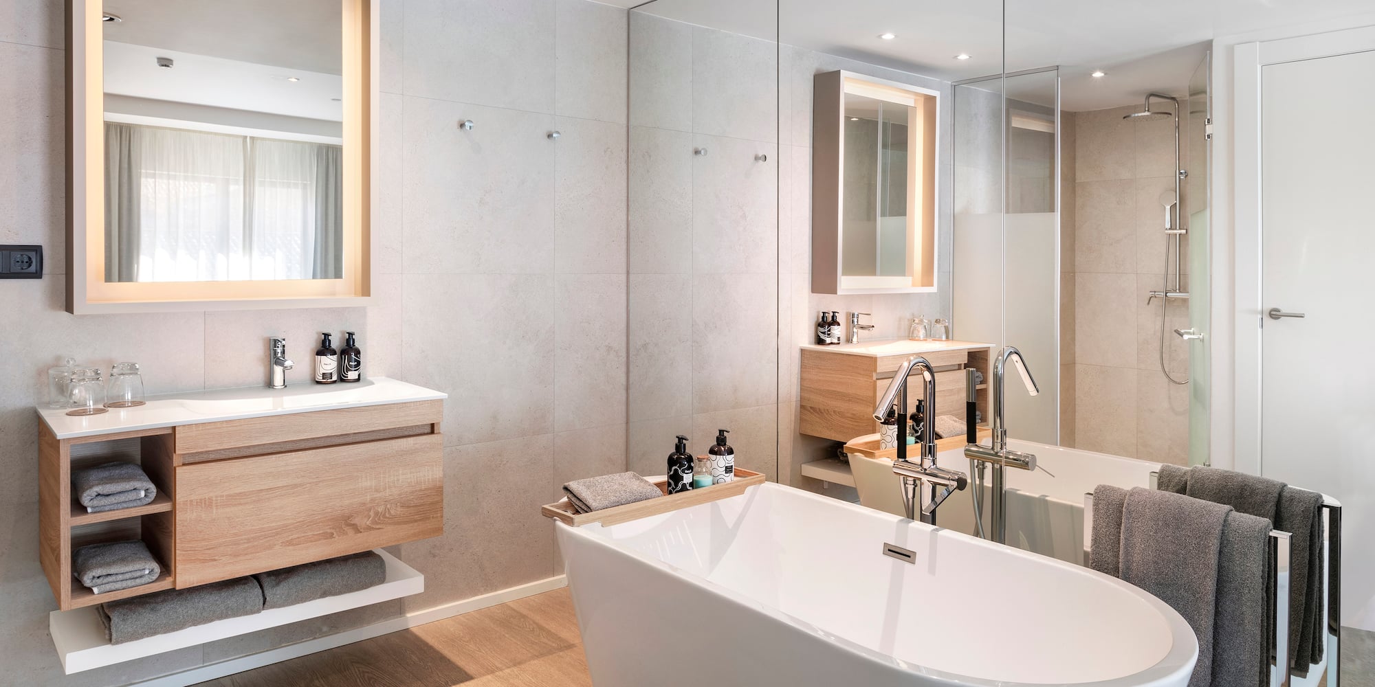 a bathroom with a tub and sink