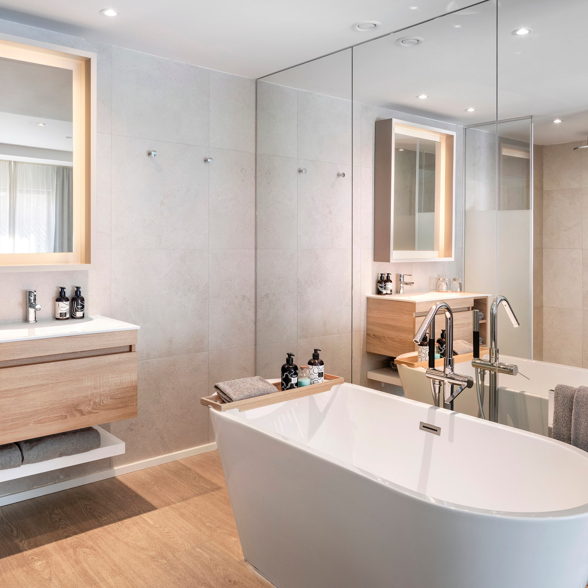 a bathroom with a tub and sink