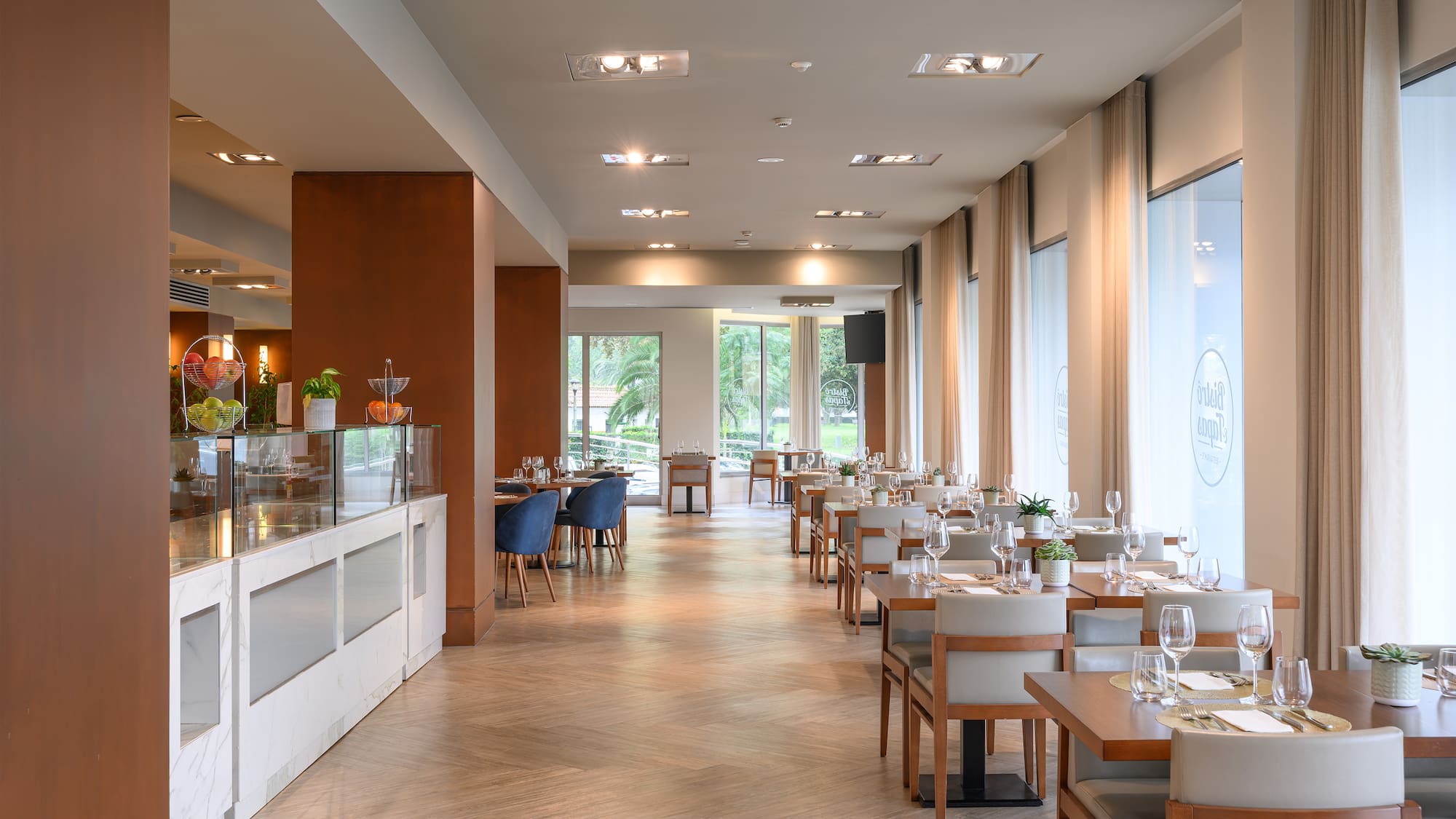 a restaurant with tables and chairs