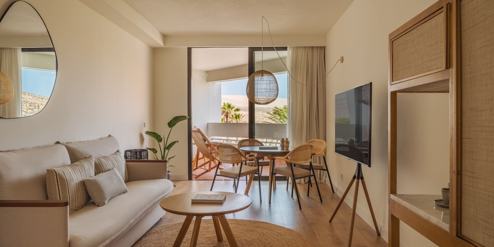 a living room with a television and a couch