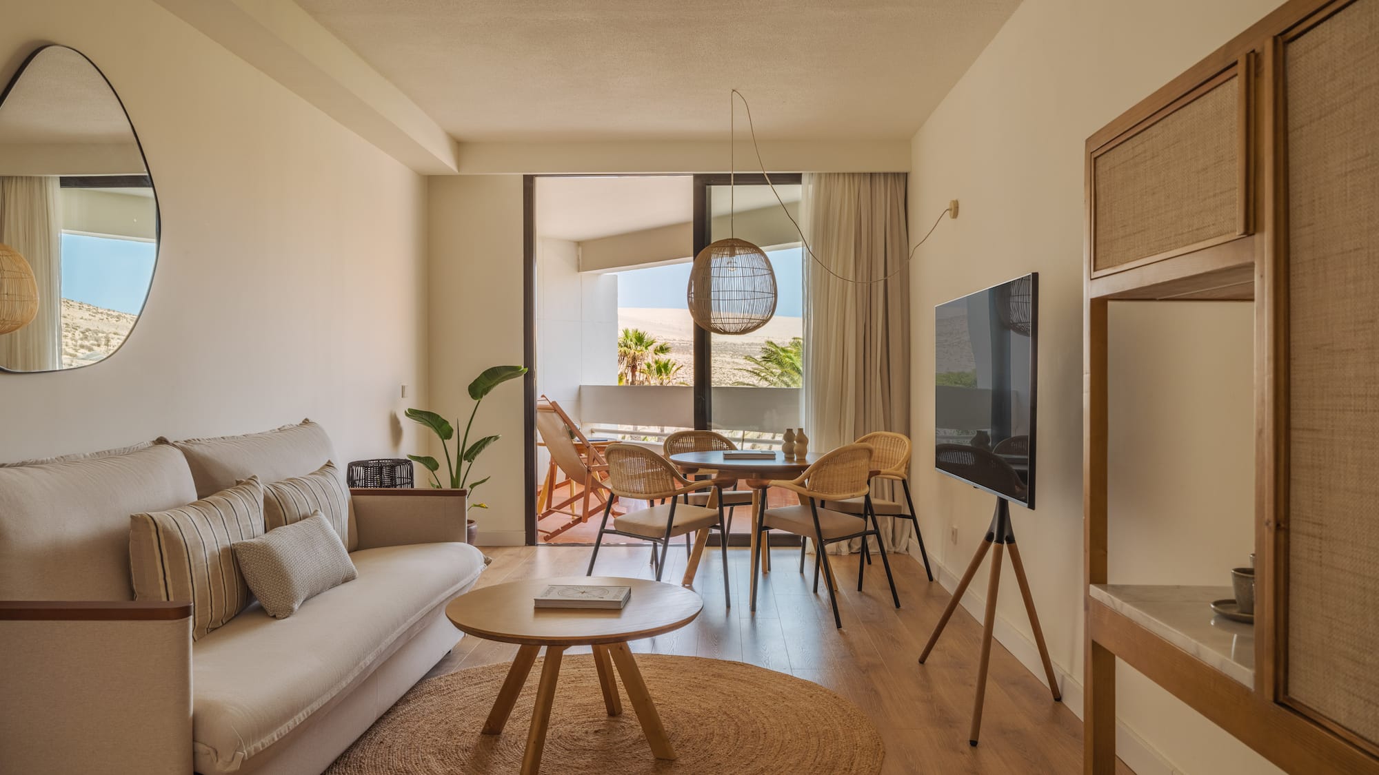 a living room with a television and a couch