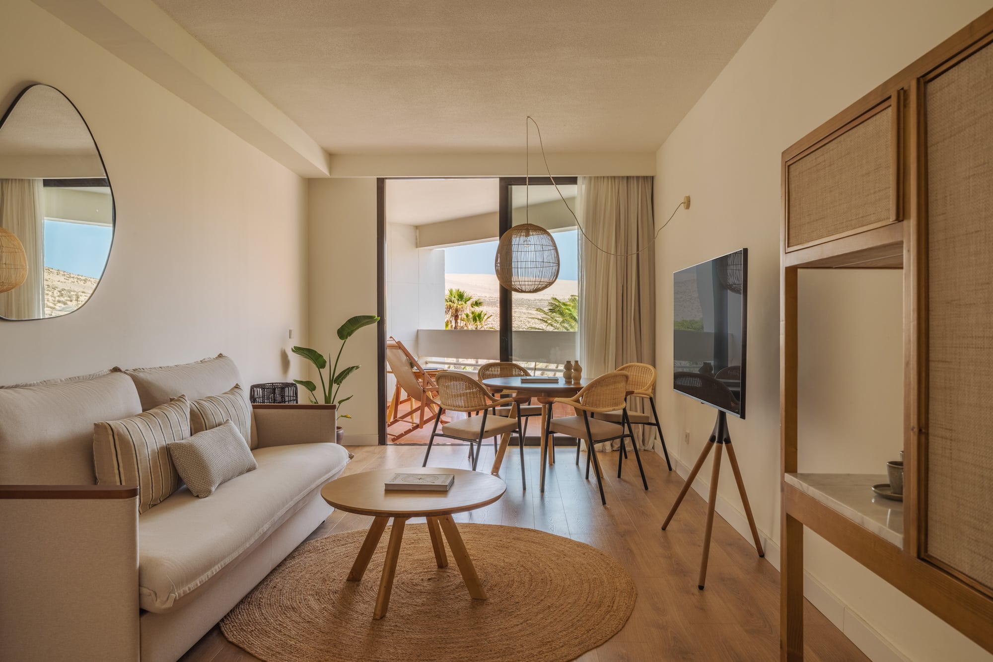 a living room with a television and a couch
