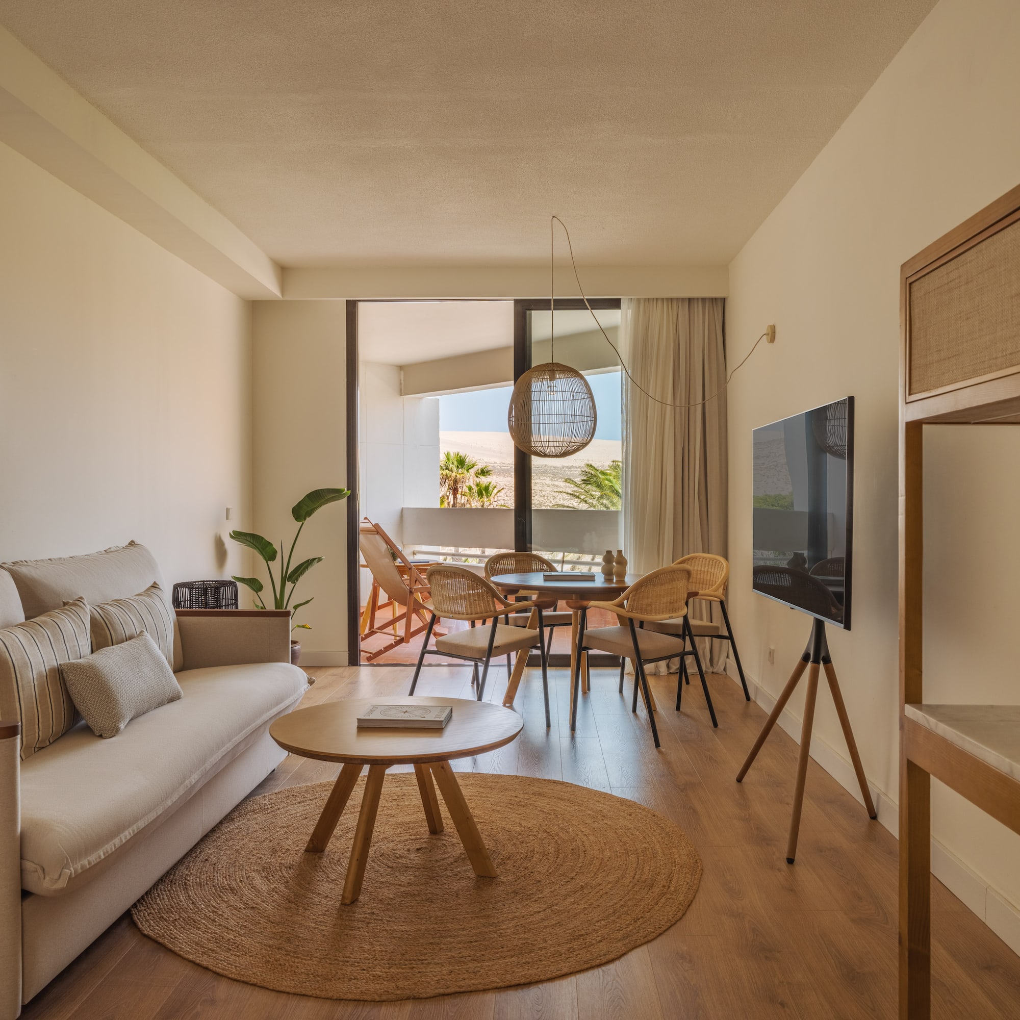 a living room with a television and a couch