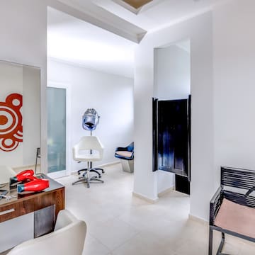 a room with a chair and a table