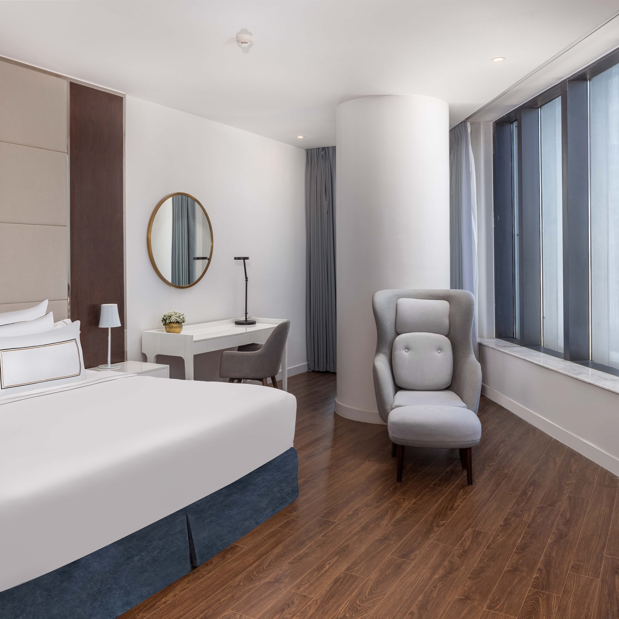 a room with a bed and a chair