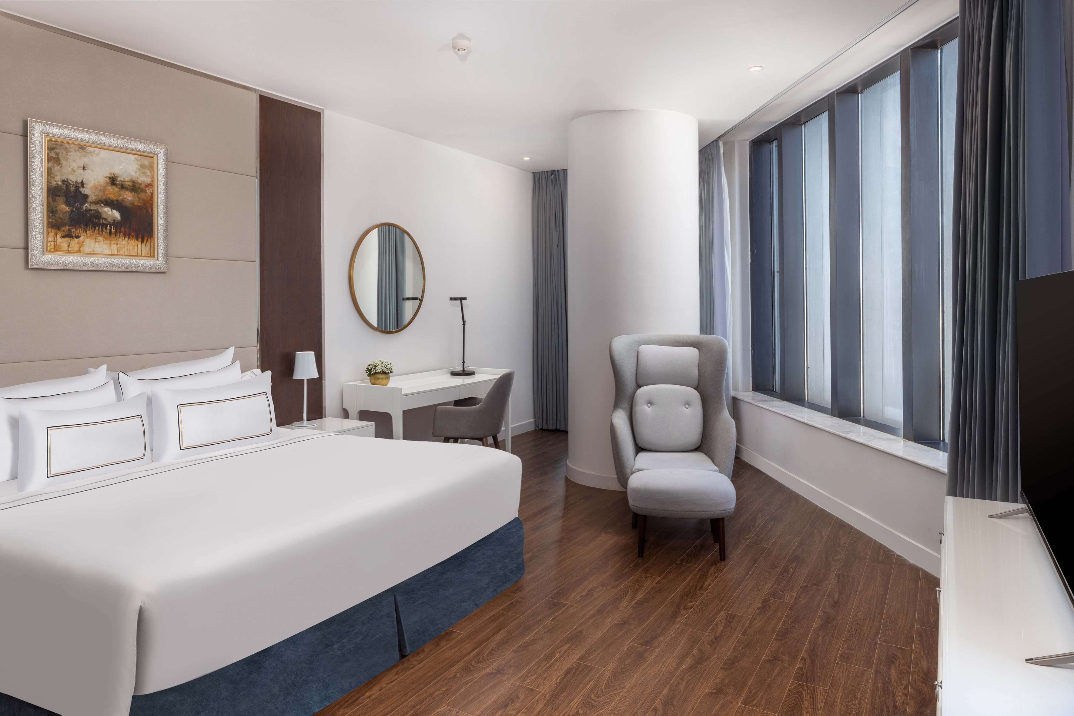 a room with a bed and a chair