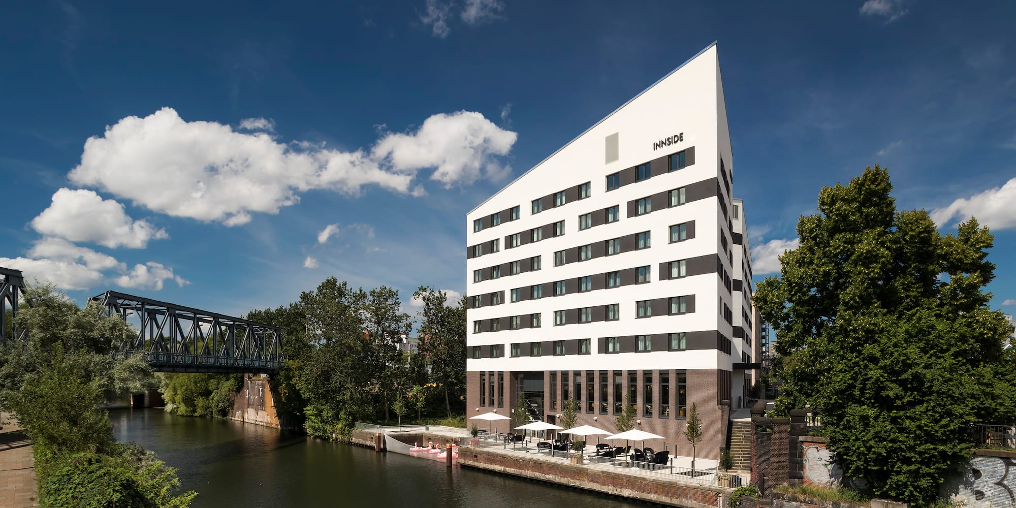 a building next to a river