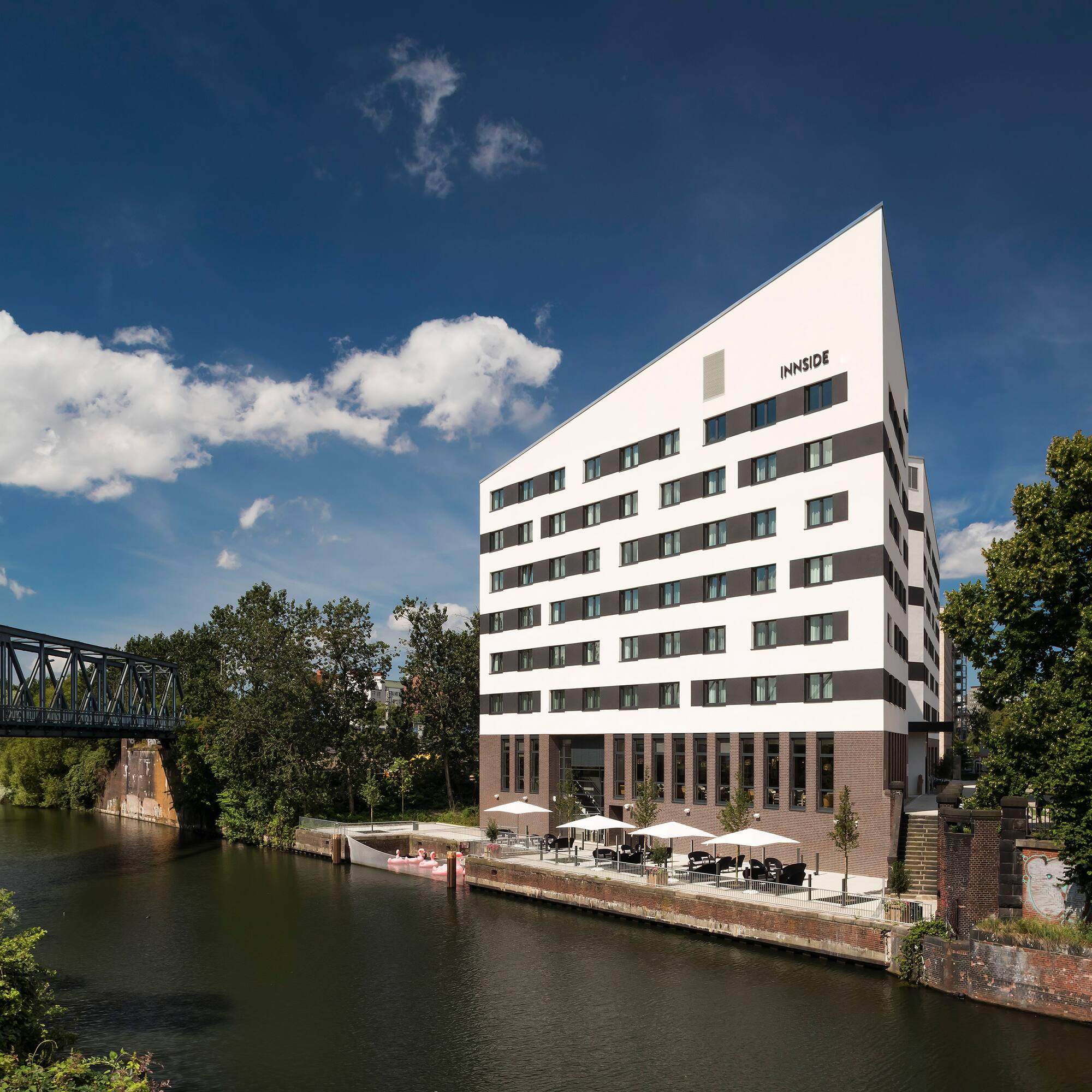 a building next to a river