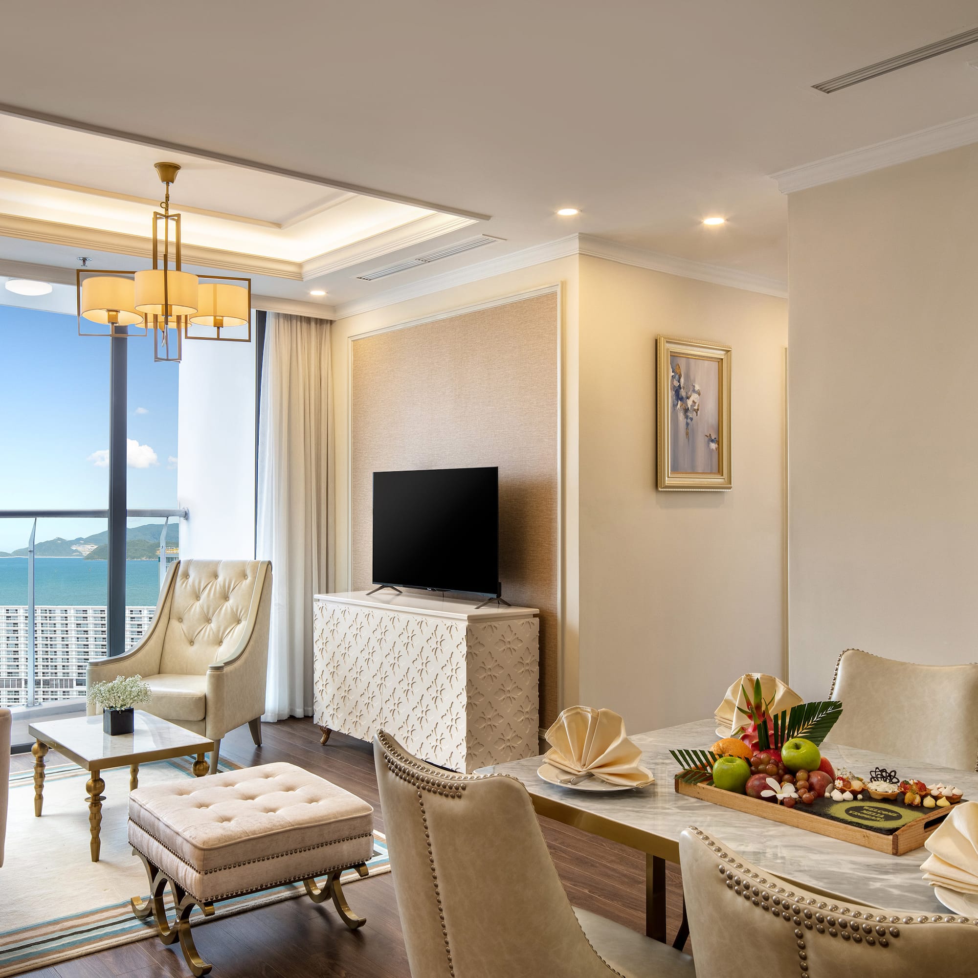 a living room with a television and a table