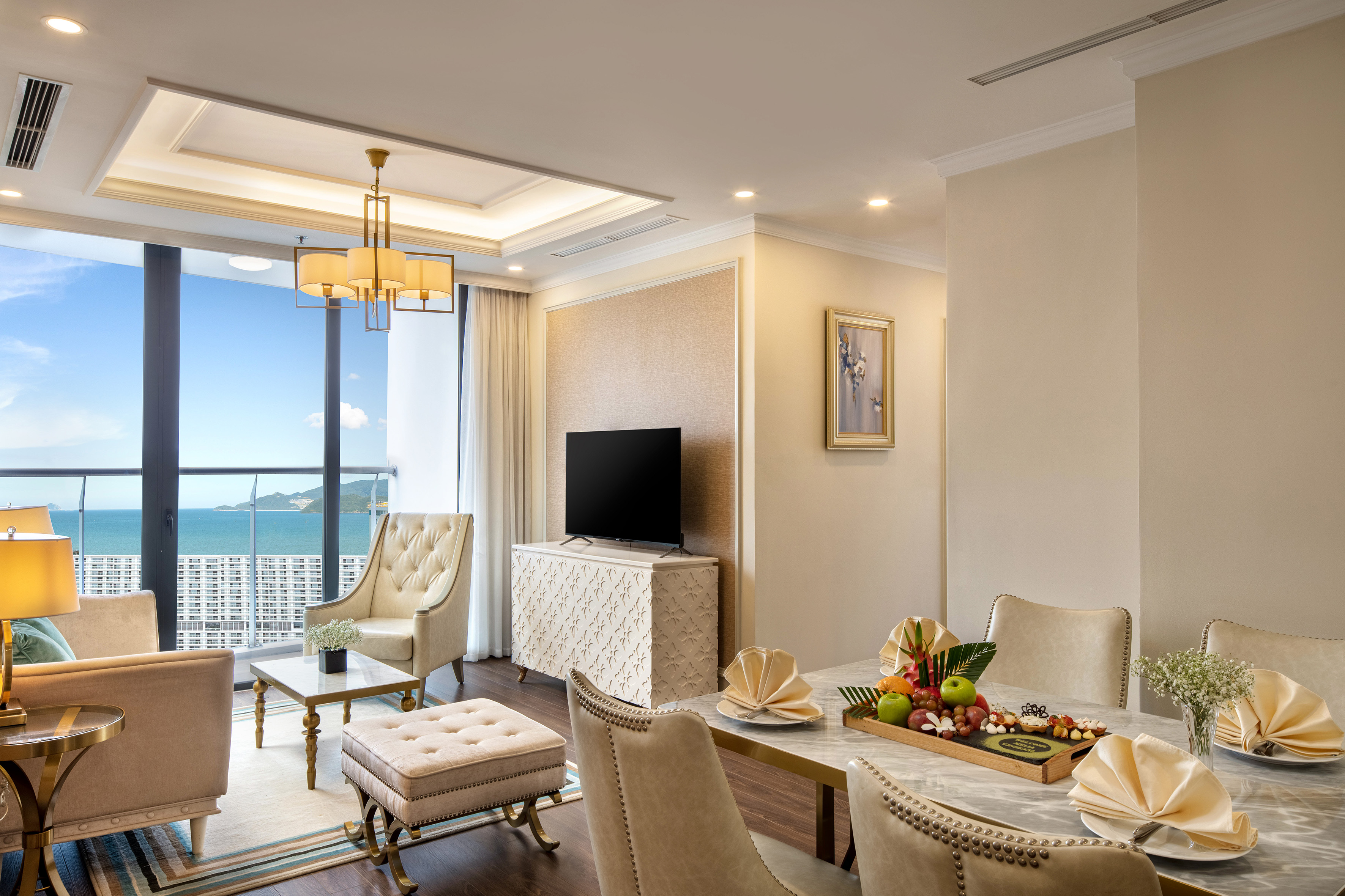 a living room with a television and a table