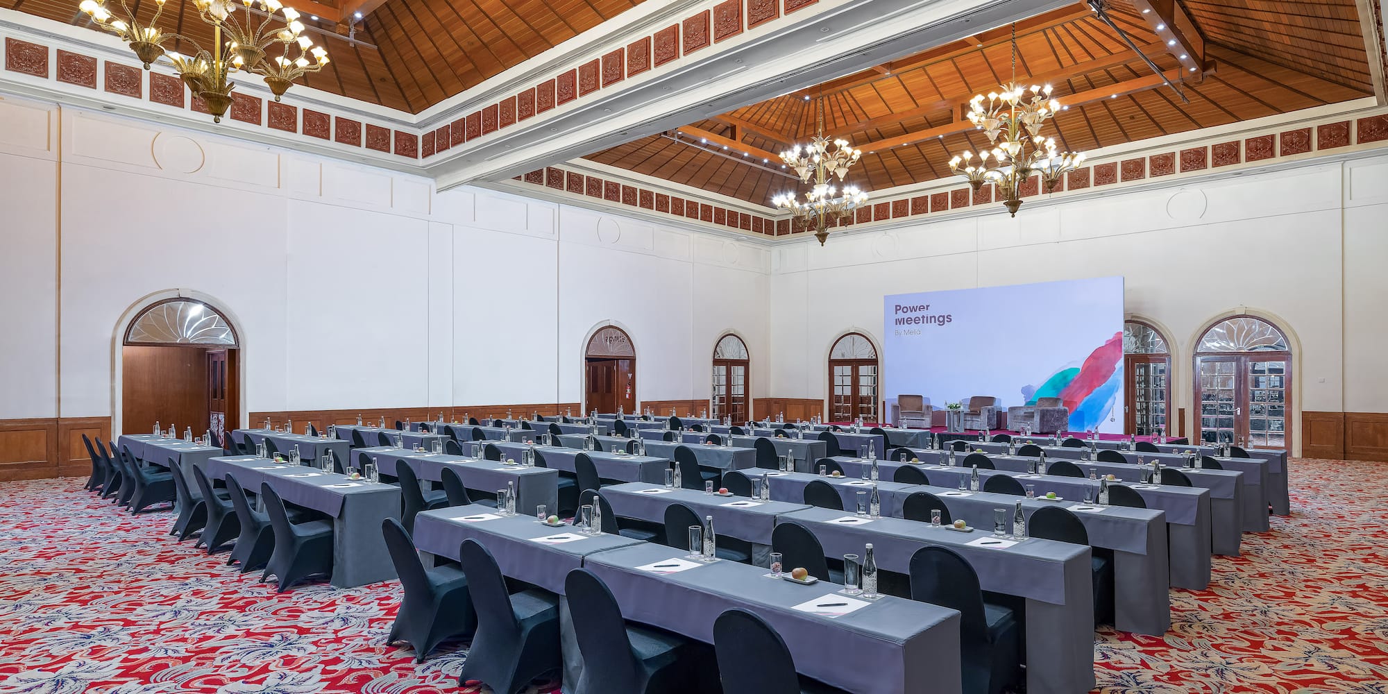 a large room with tables and chairs