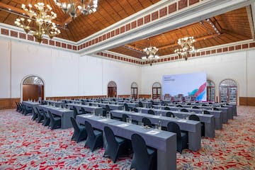 a large room with tables and chairs