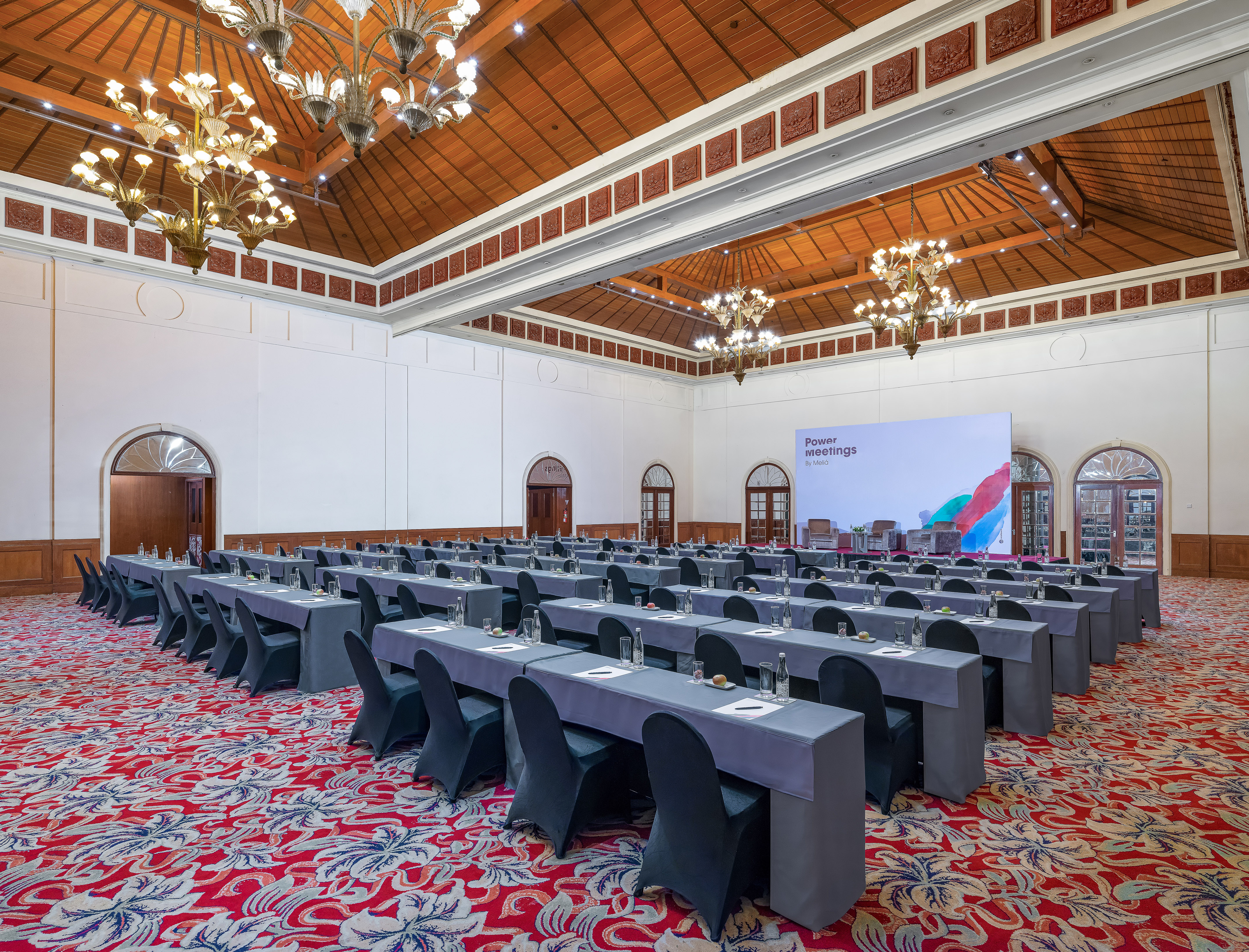 a large room with tables and chairs