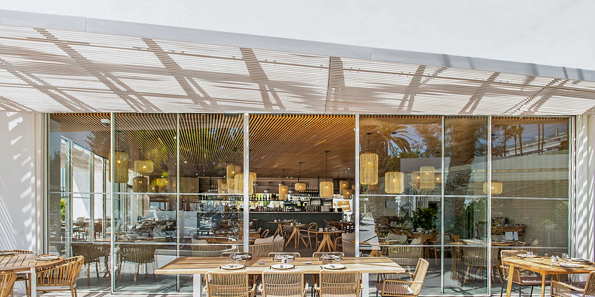 a restaurant with tables and chairs