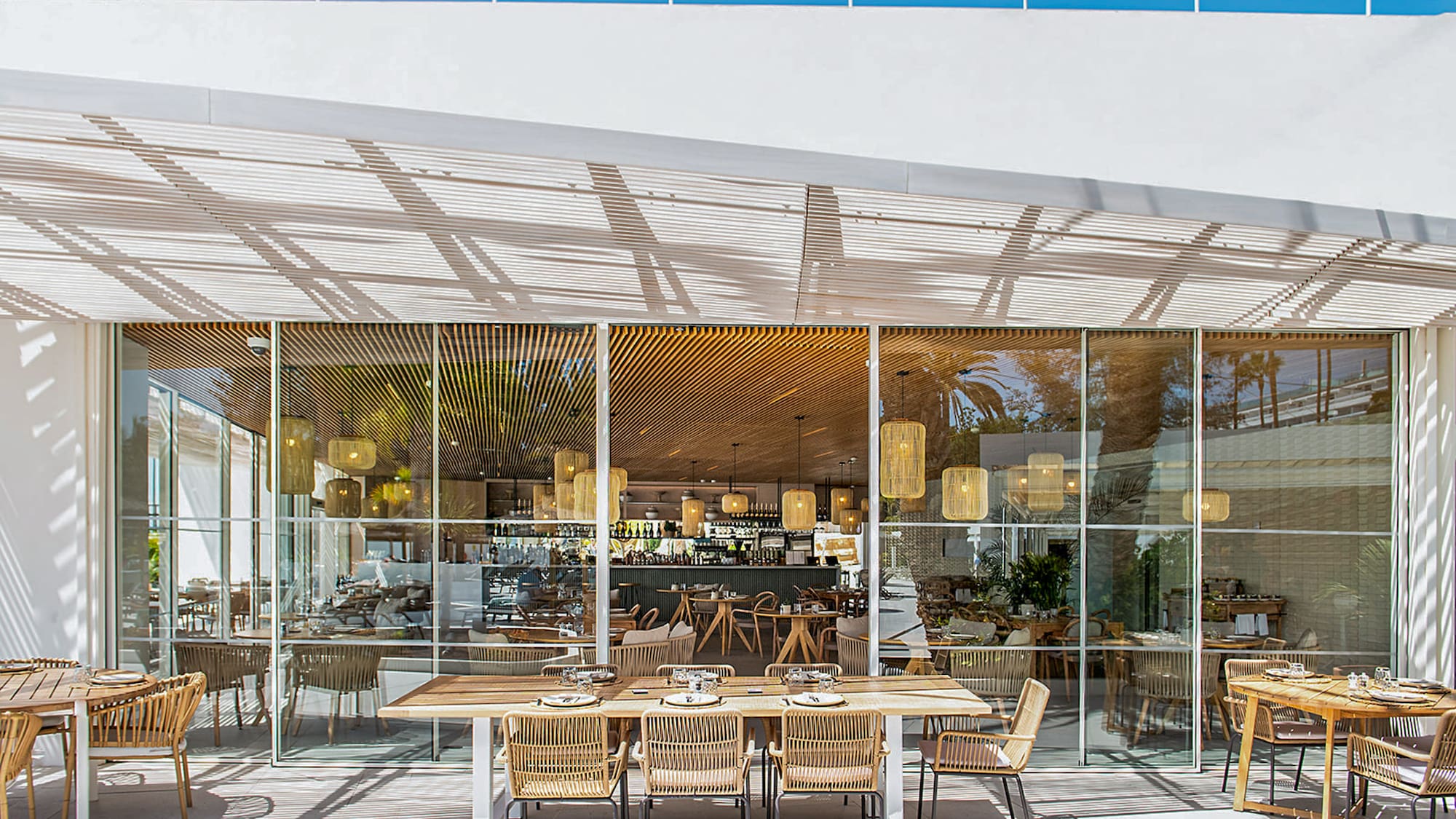 a restaurant with tables and chairs