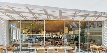 a restaurant with tables and chairs