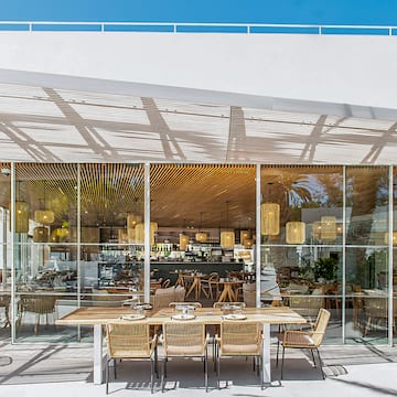 a restaurant with tables and chairs