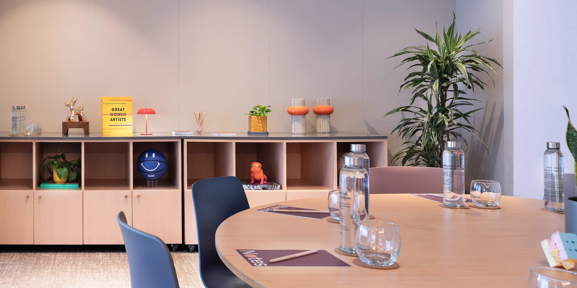 a room with a table and chairs