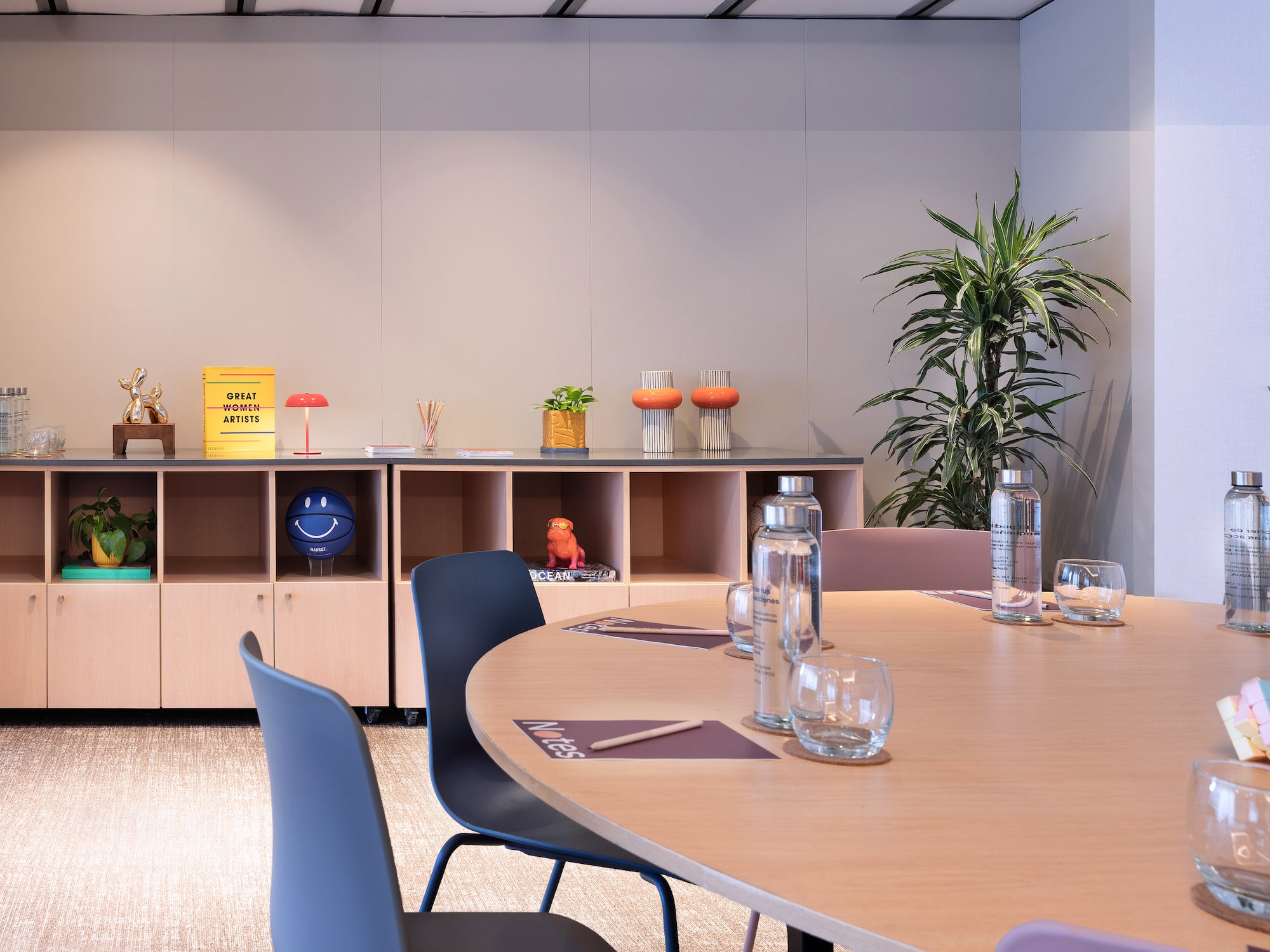 a room with a table and chairs