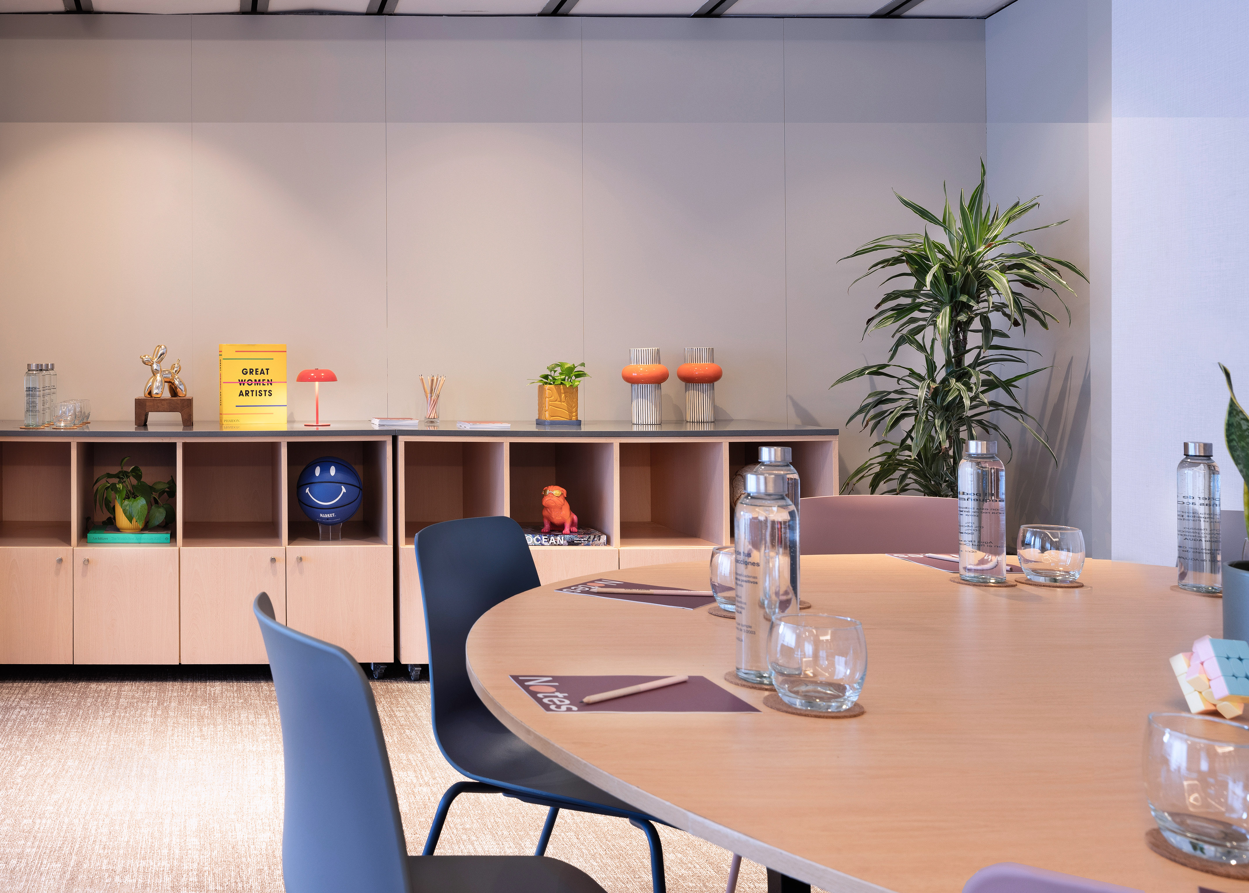 a room with a table and chairs