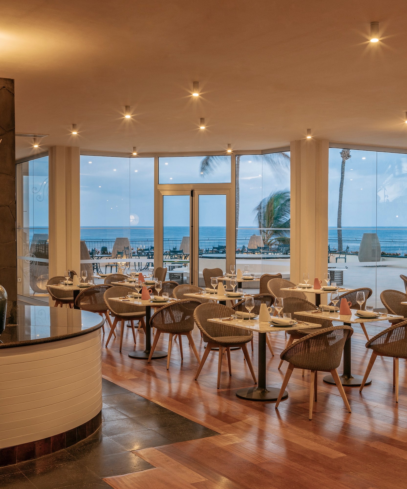 a restaurant with tables and chairs