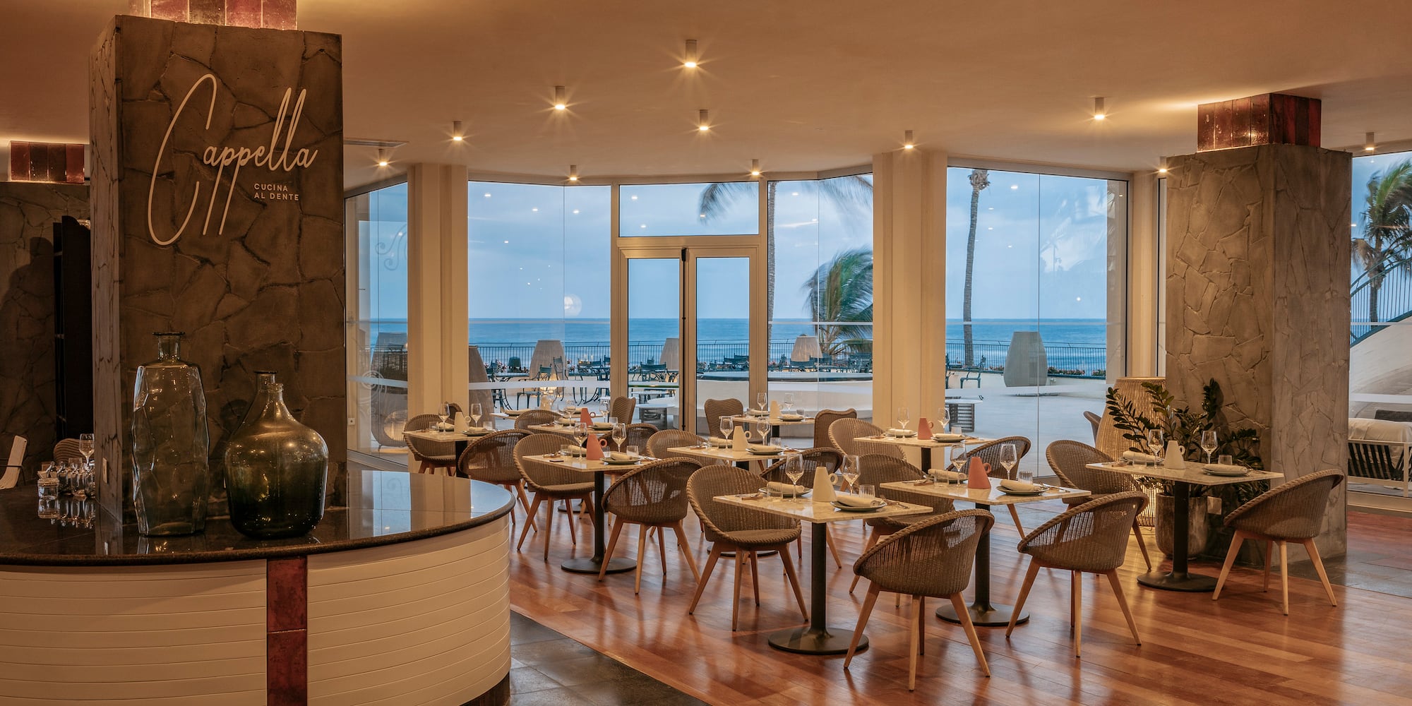 a restaurant with tables and chairs