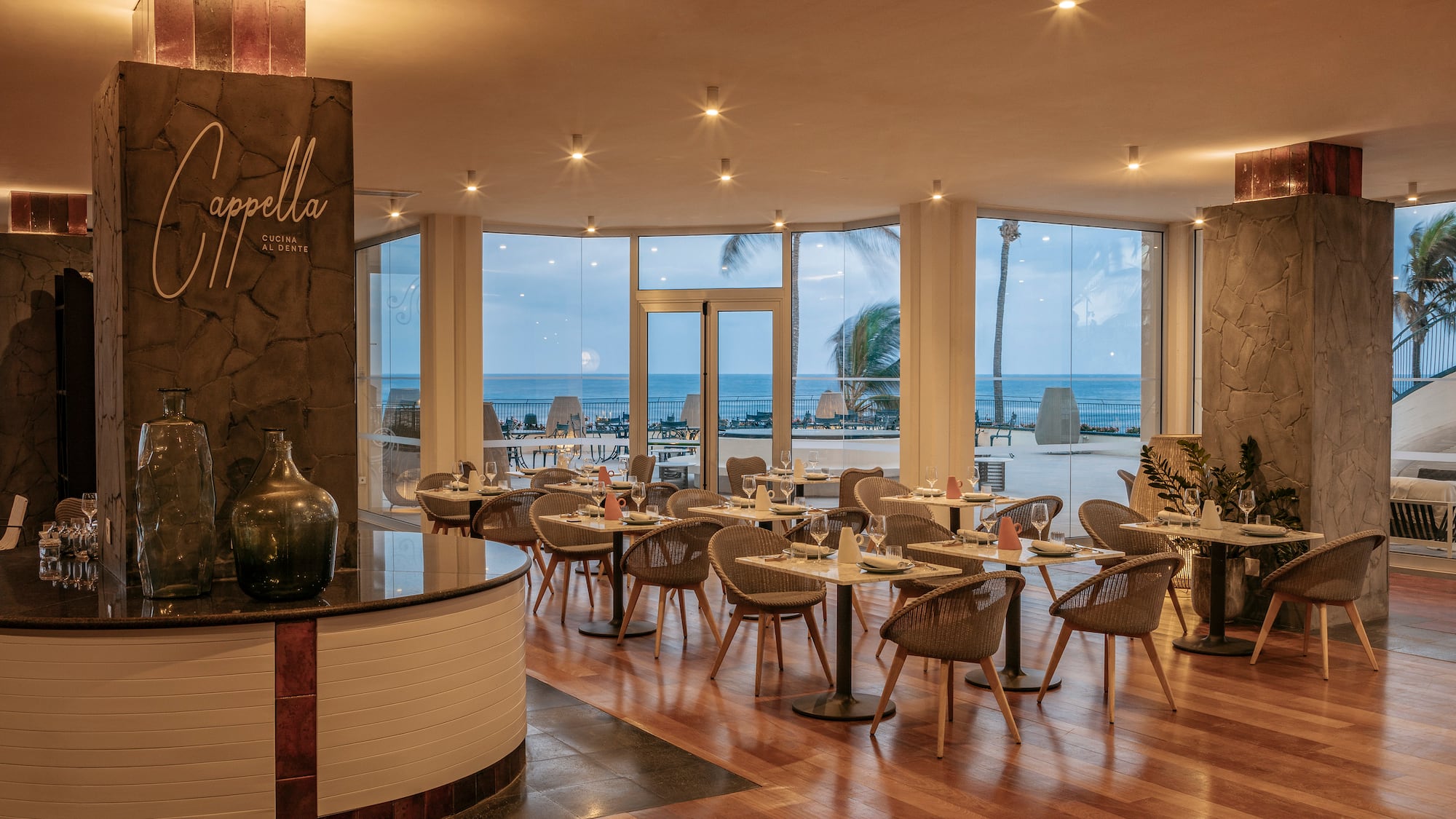 a restaurant with tables and chairs