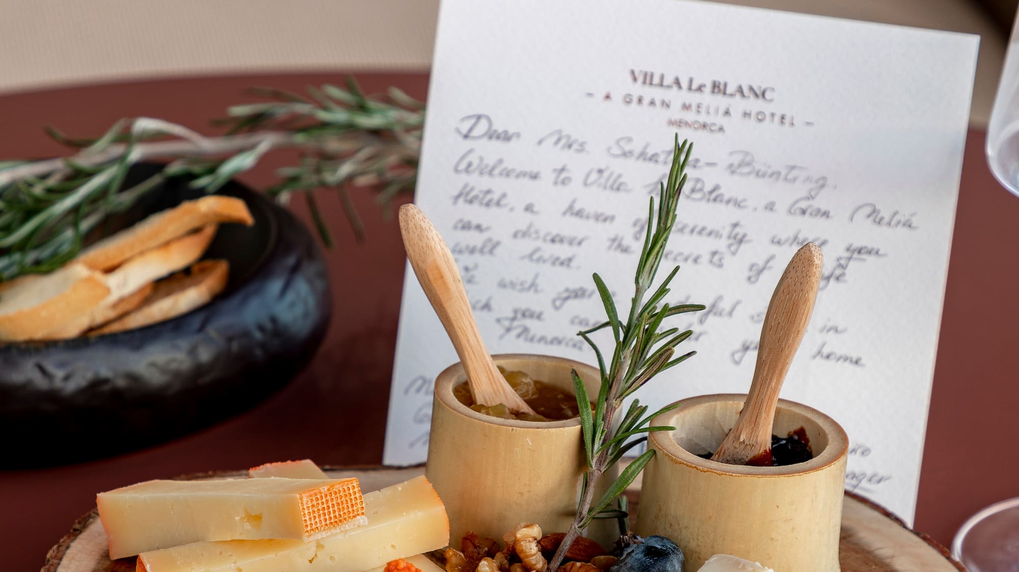 a plate of cheese and nuts