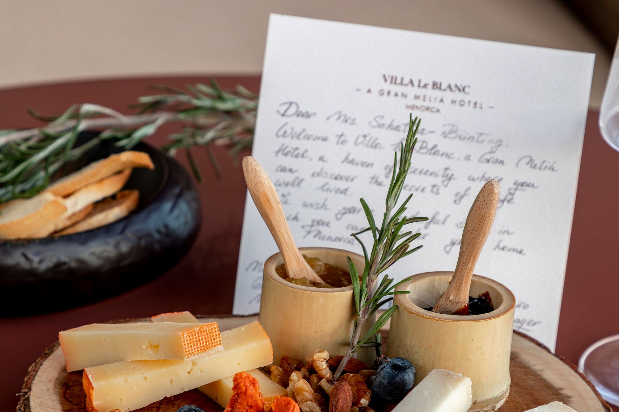 a plate of cheese and nuts