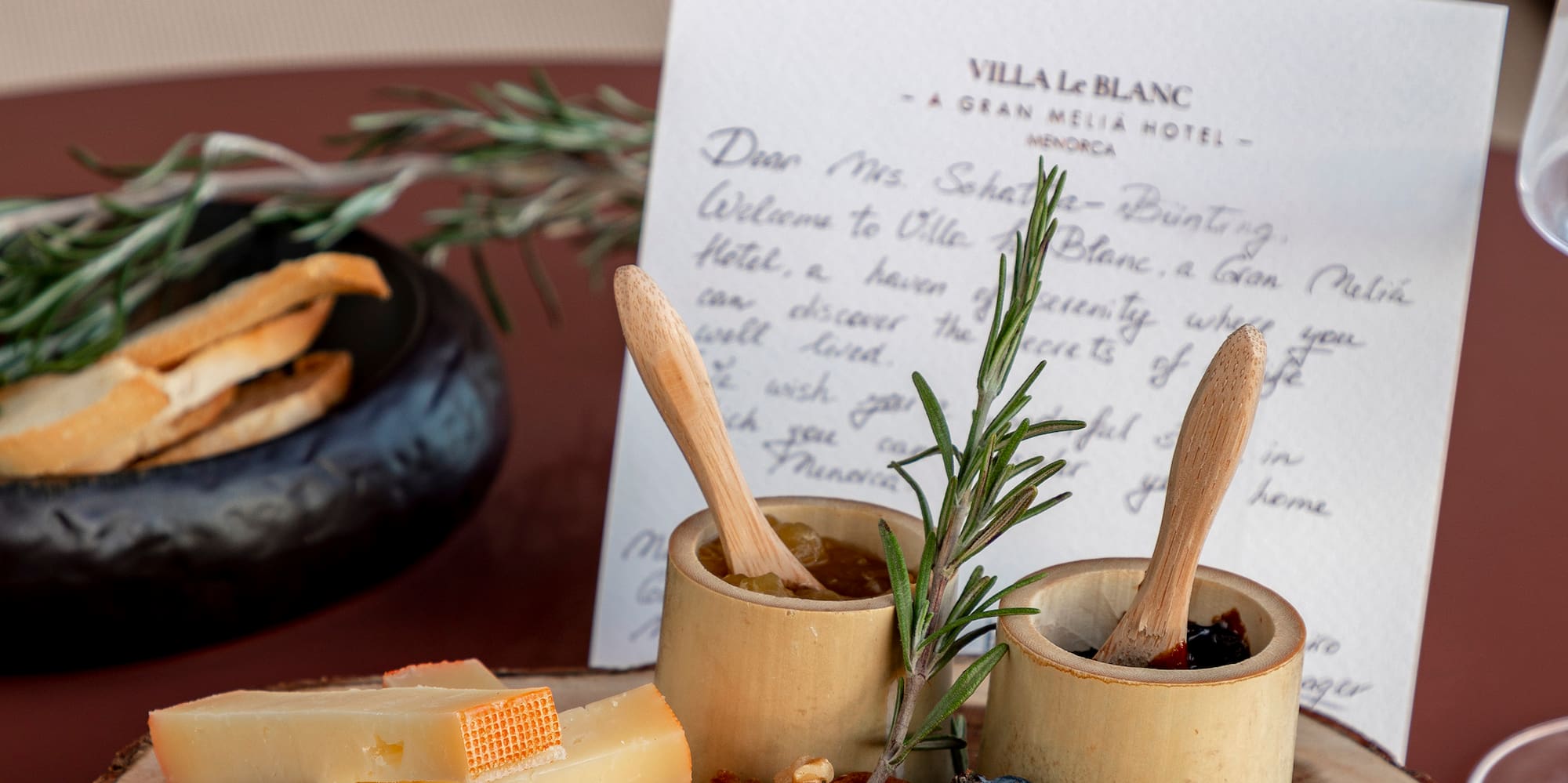 a plate of cheese and nuts