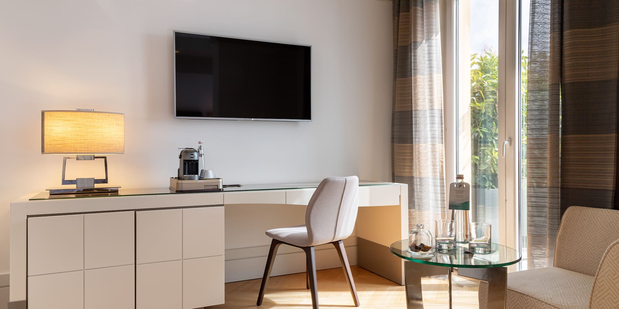 a room with a tv on the wall