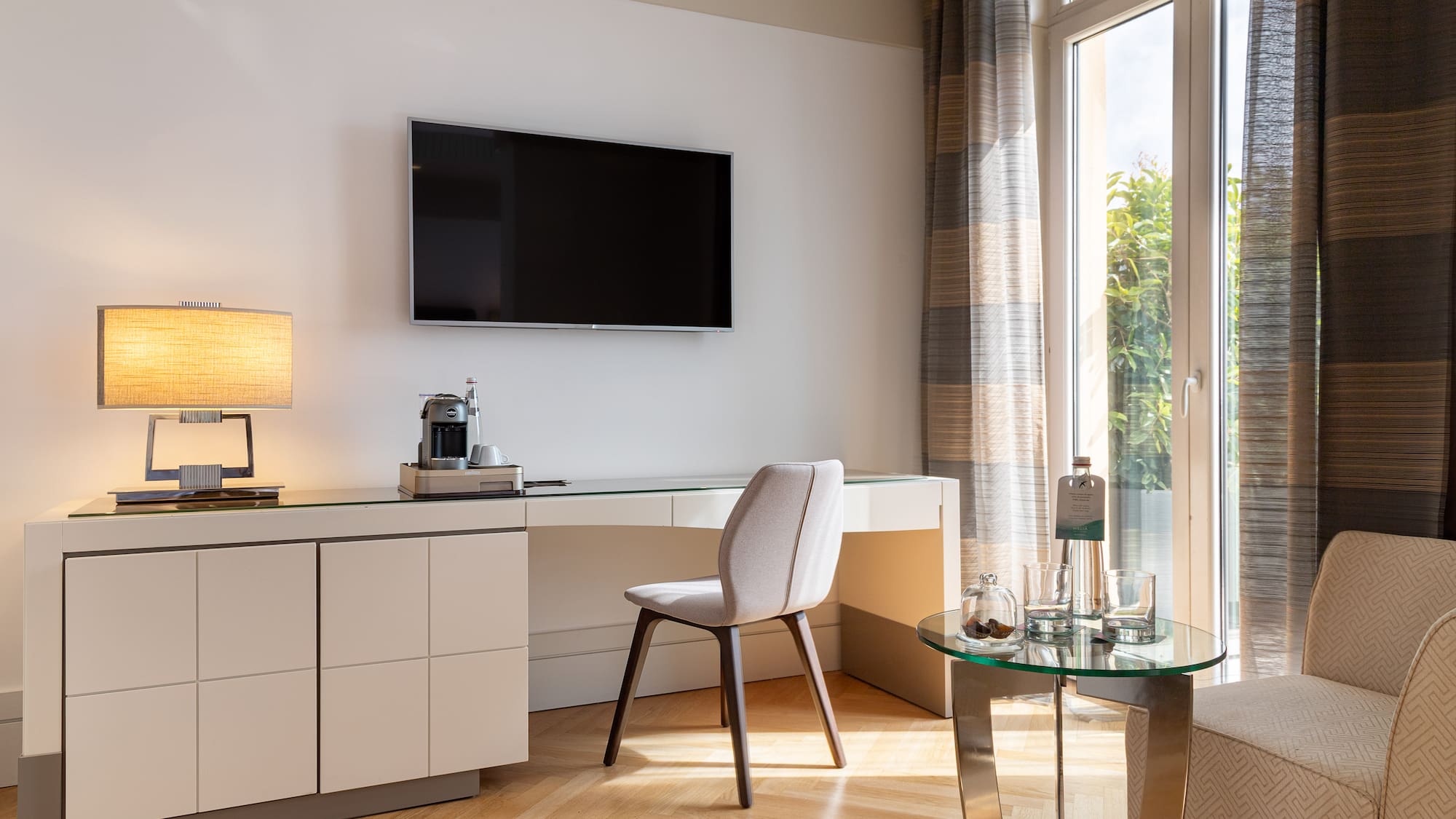 a room with a tv on the wall