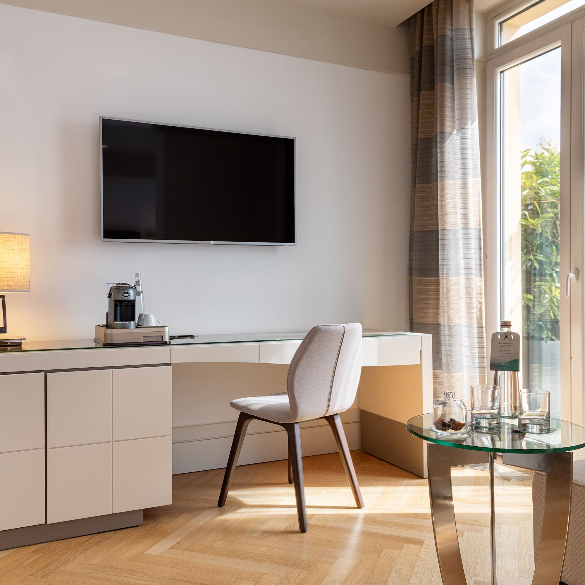 a room with a tv on the wall