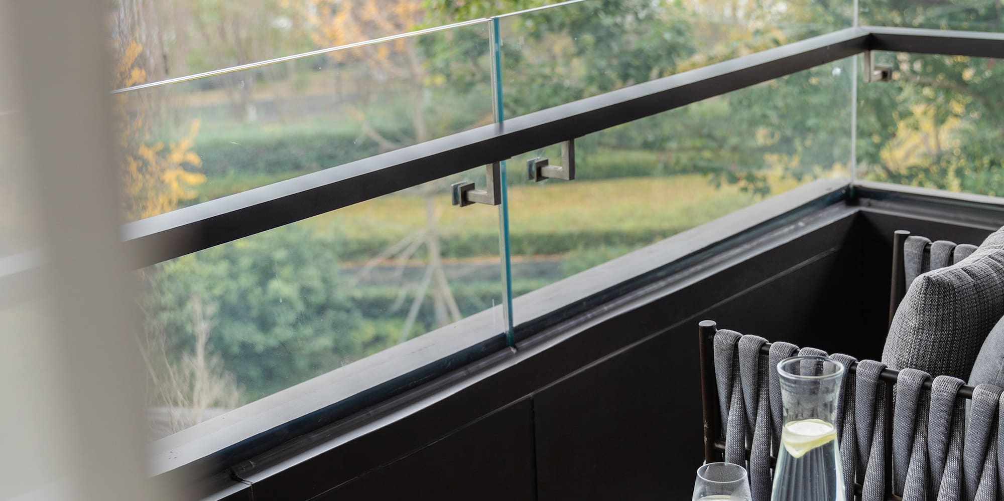 a table with a pen and glasses on it