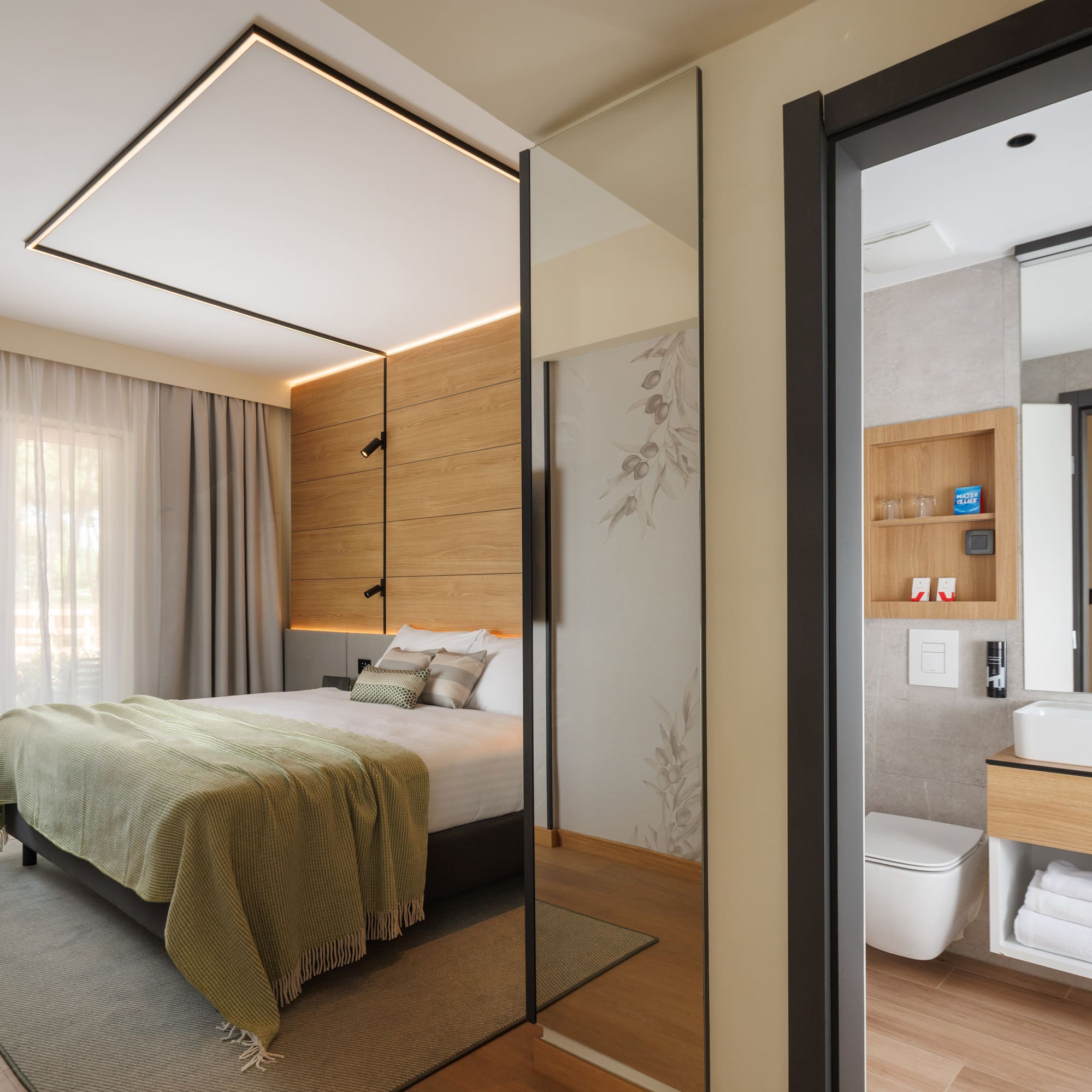 a bedroom with a glass door