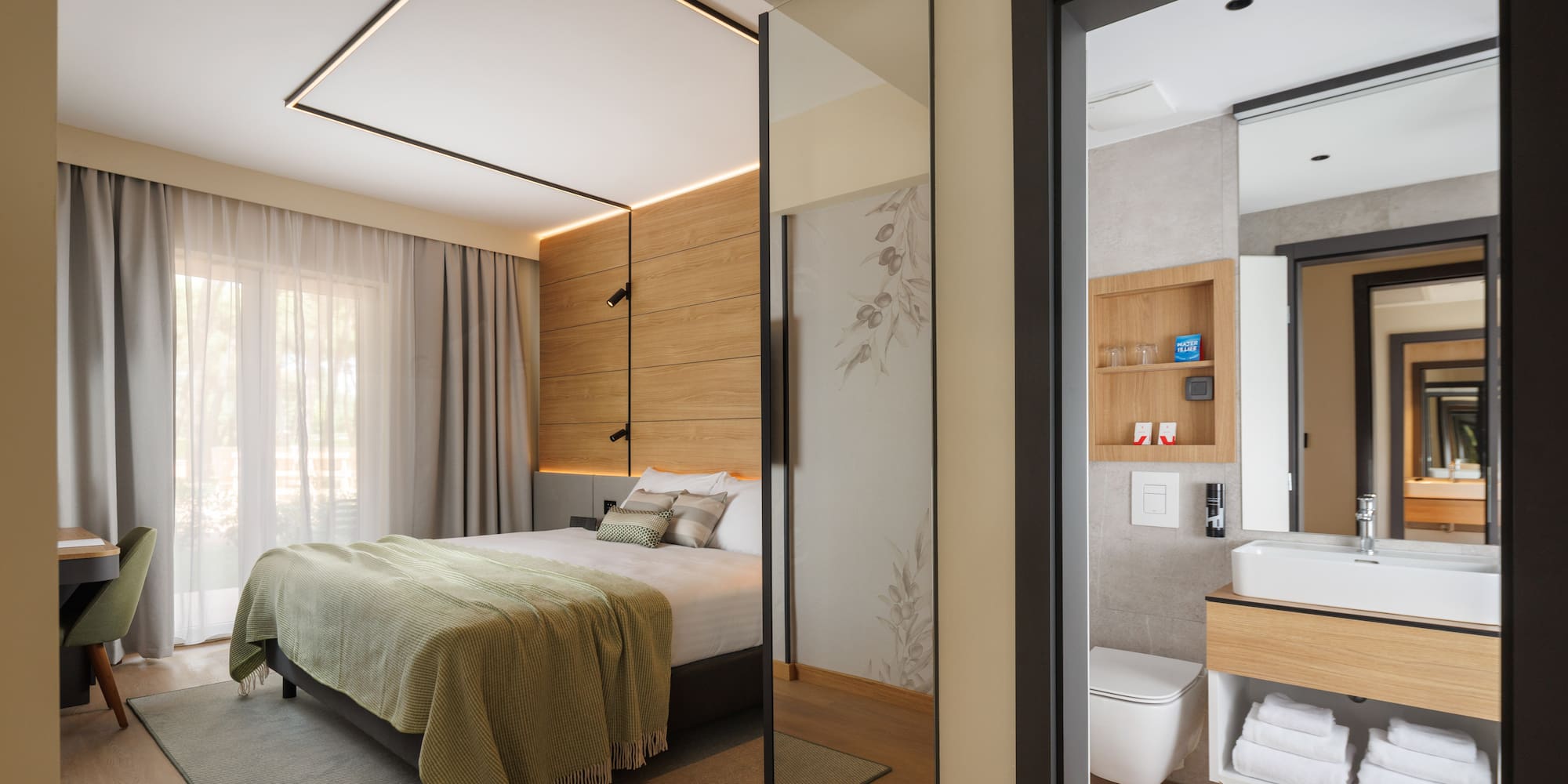 a bedroom with a glass door