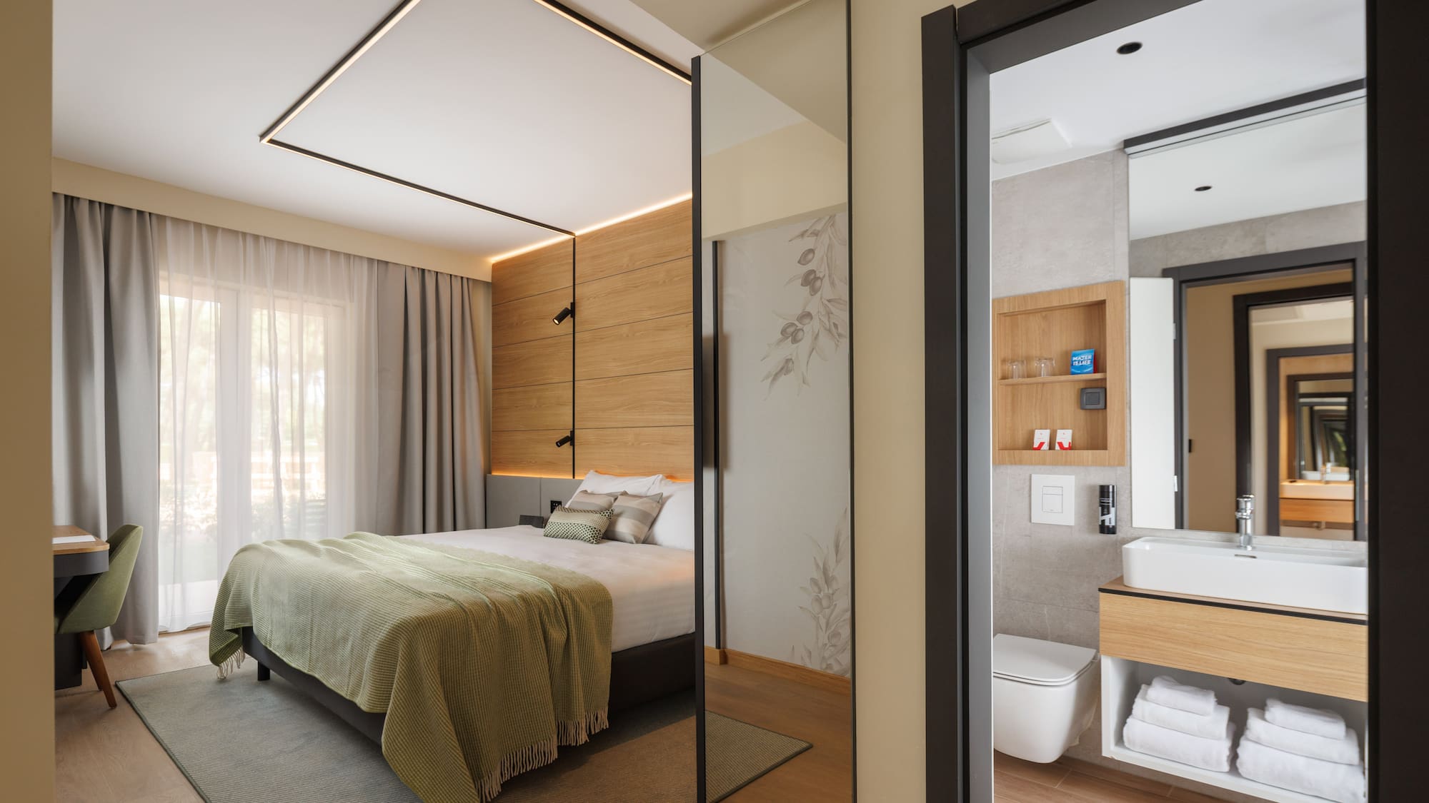 a bedroom with a glass door