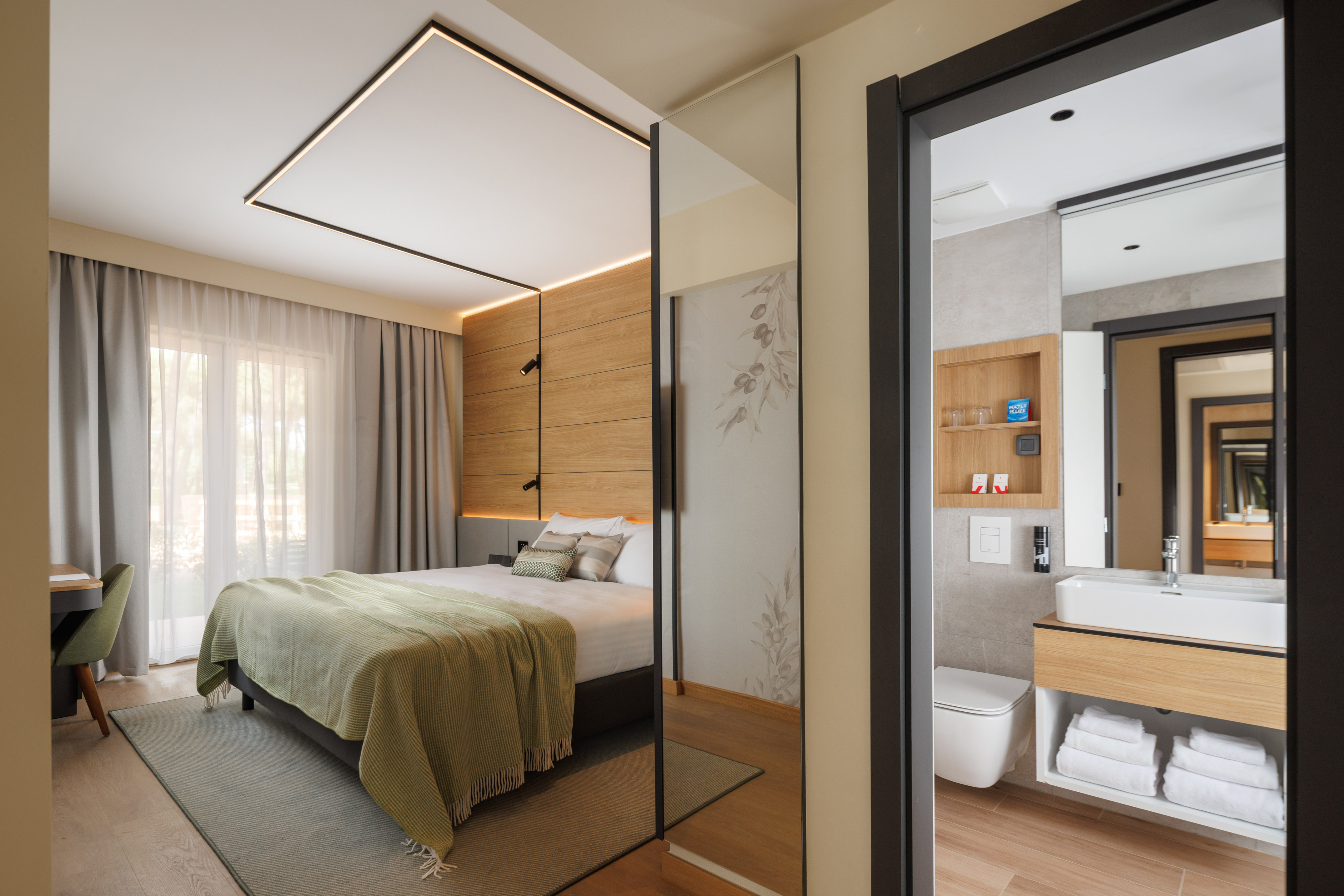 a bedroom with a glass door