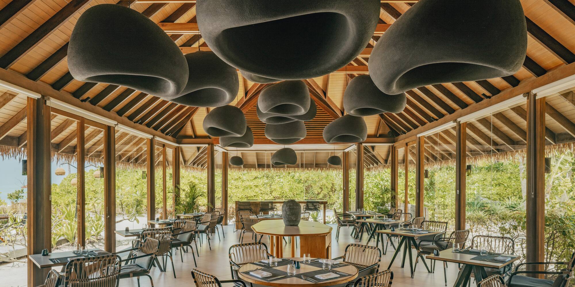 a room with tables and chairs