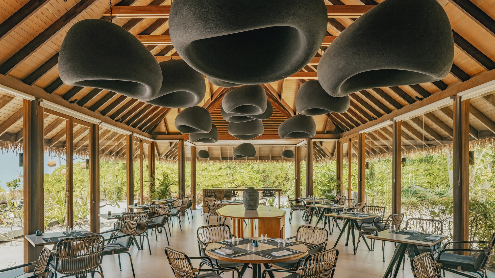 a room with tables and chairs