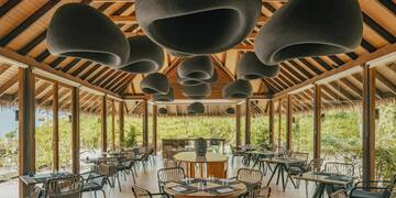 a room with tables and chairs